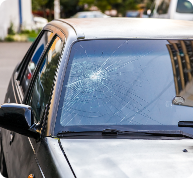 Vehicle with cracked windscreen