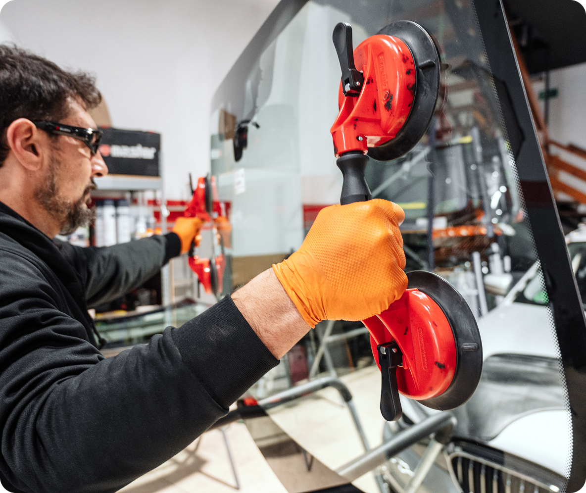 Technician working on a windscreen